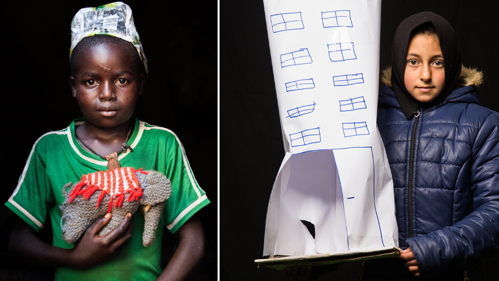 A boy holds a rag doll animal a girl holds a paper building